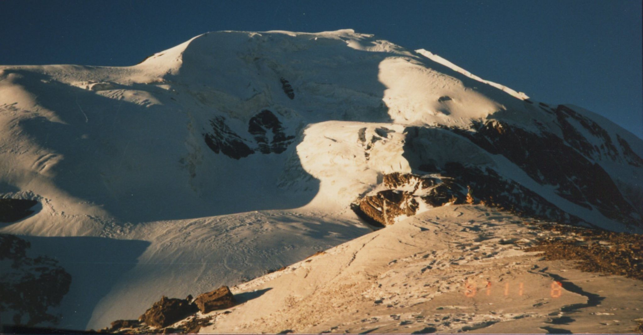 Tharong Peak ( Thorong Ri ) above Tharong La on crossing Tharong La high pass on Annapurna circuit trek in the Nepal Himalaya