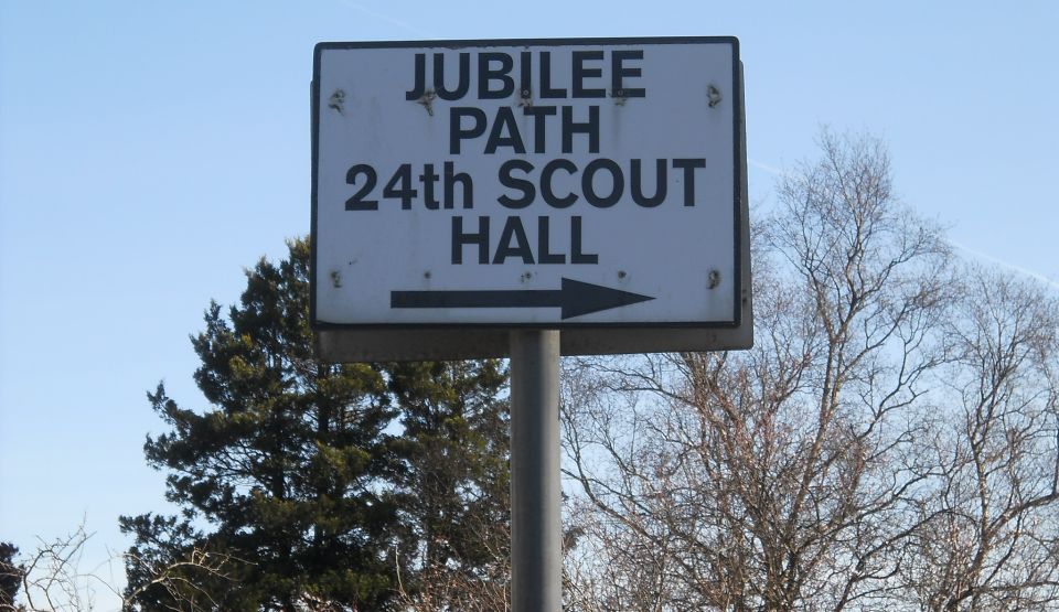 Signpost on Roman Road to Hall of the 24th Scout Group in Bearsden