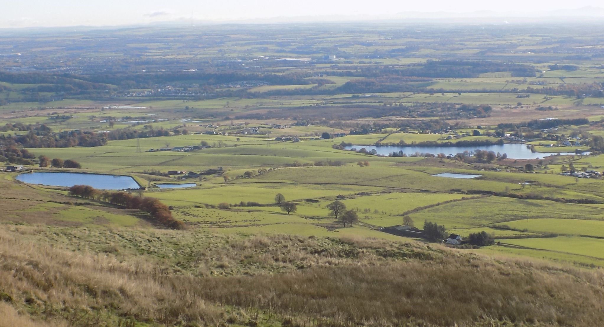 Woodburn Reservoir and Antermony Loch on ascent to Cort-ma Law