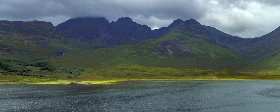 Blaven ( Bla Bheinn ) and Clach Glas from Loch Slapin on Isle of Skye in Western Islands of Scotland